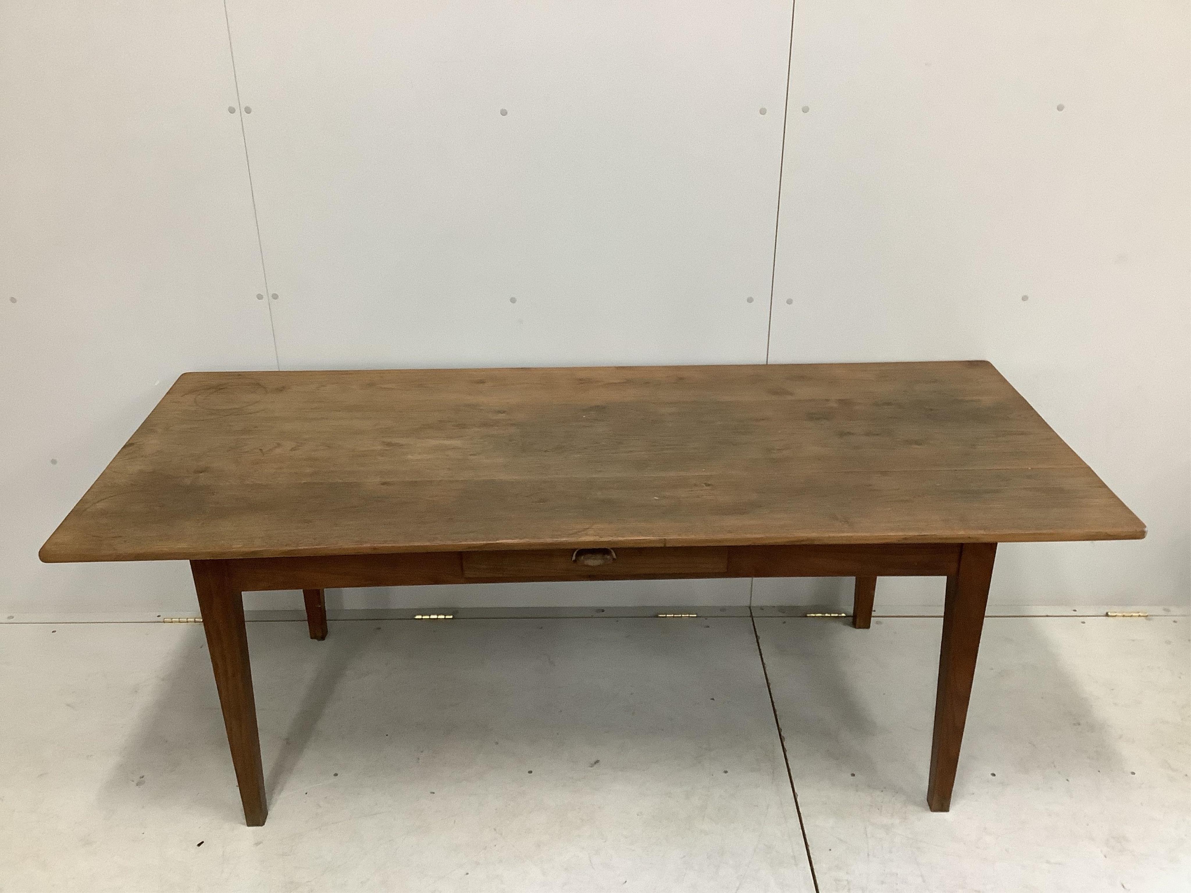 A 19th century French oak rectangular kitchen table, width 198cm, depth 82cm, height 73cm. Condition - fair